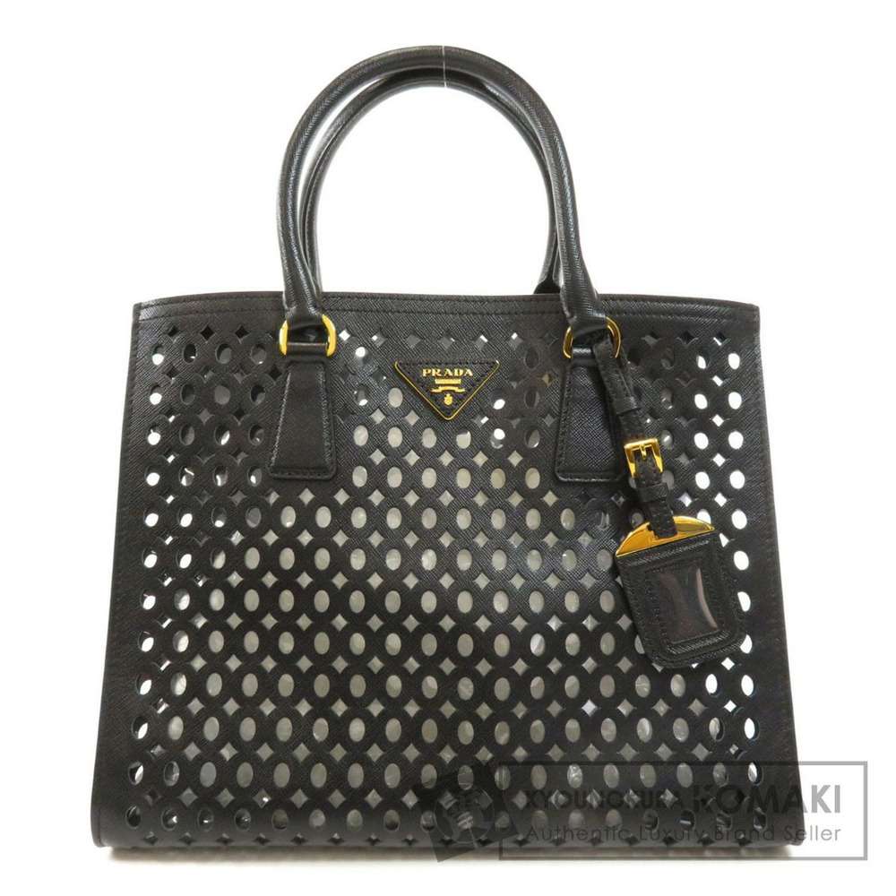 Prada perforated motif handbag leather vinyl